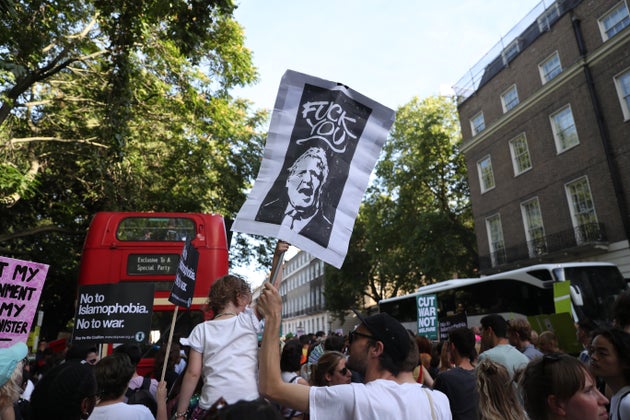 Protestors Target Boris Johnson On His First Day As PM