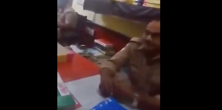 A screen grab from the viral video in which the Kanpur cop can be harassing the minor girl. 