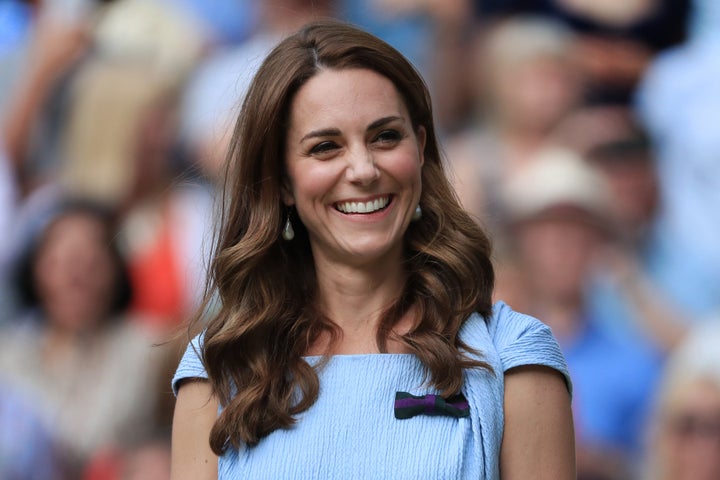 The Duchess of Cambridge laughs and smiles on Day 13 of The Championships - Wimbledon 2019 at the All England Lawn Tennis and Croquet Club on July 14, 2019 in London, England.