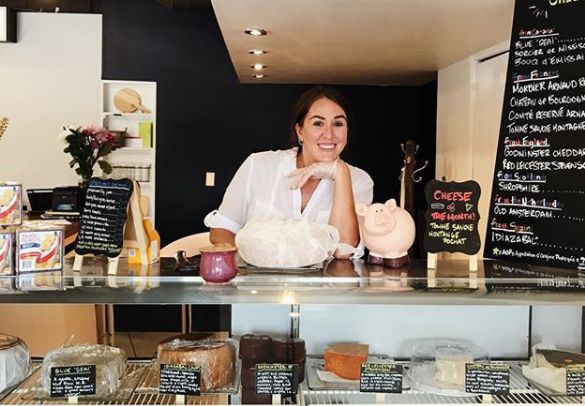 Author Aleana Young two years ago on the opening day of her artisanal cheese shop in Regina, Sask.