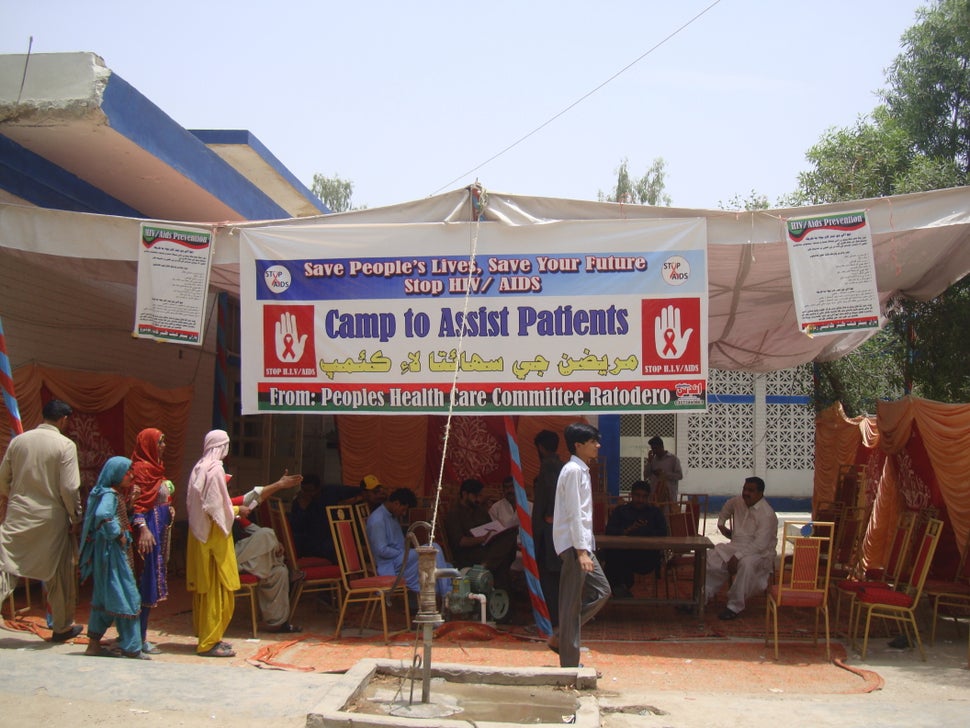 <i>A screening camp in Ratodero. HIV test kits, with results available within 30 minutes, are administered free of charge.</i