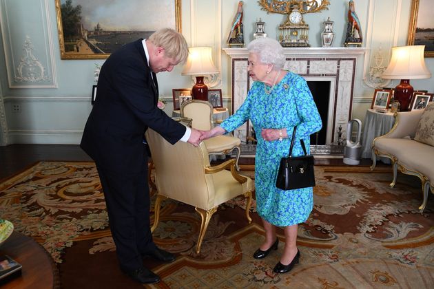 Queen Elizabeth II greets Boris Johnson. 