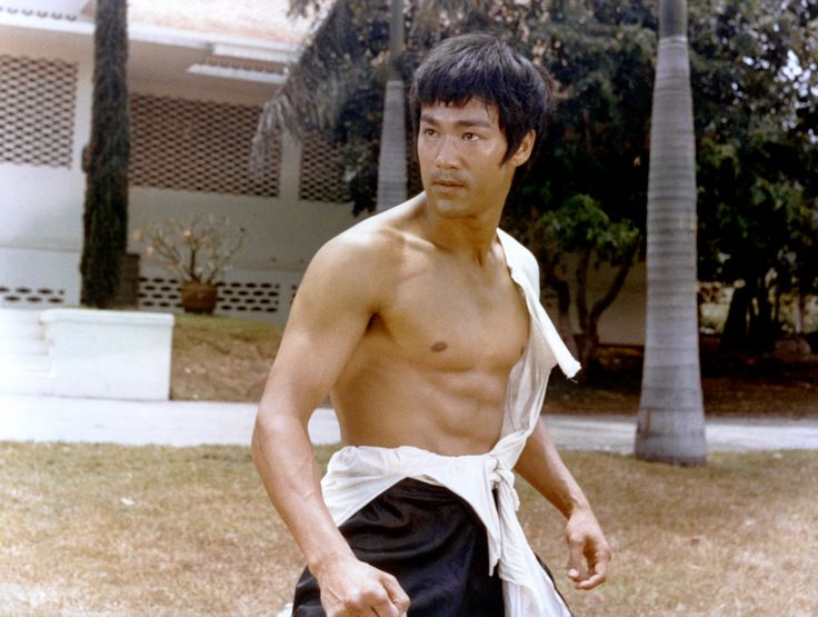 A shirtless Lee on the set of "Tang Shan Da Xiong" ("Big Boss"), written and directed by Wei Lo.