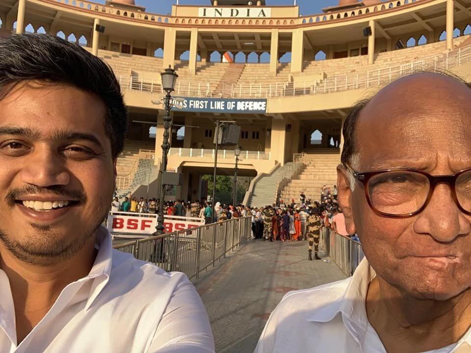 Rohit Pawar with his grandfather Sharad Pawar in a file photo