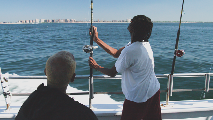 Bryant takes some of the young men he fosters on fishing trips.