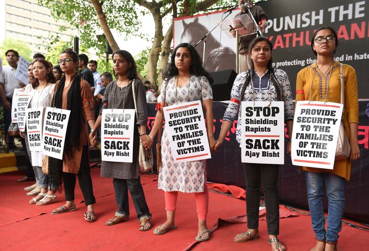 People take part in 'Not In My Name' protest against the Kathua and Unnao rape cases, at Parliament Street, in April 2018 in New Delhi, the same week the Unnao girl's father died after he was allegedly beaten by the men of the rape accused.