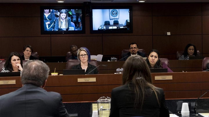 From left, Nevada state Reps. Alexis Hansen, Sarah Peters, and Selena Torres at a hearing in Carson City, Nevada, in April. N