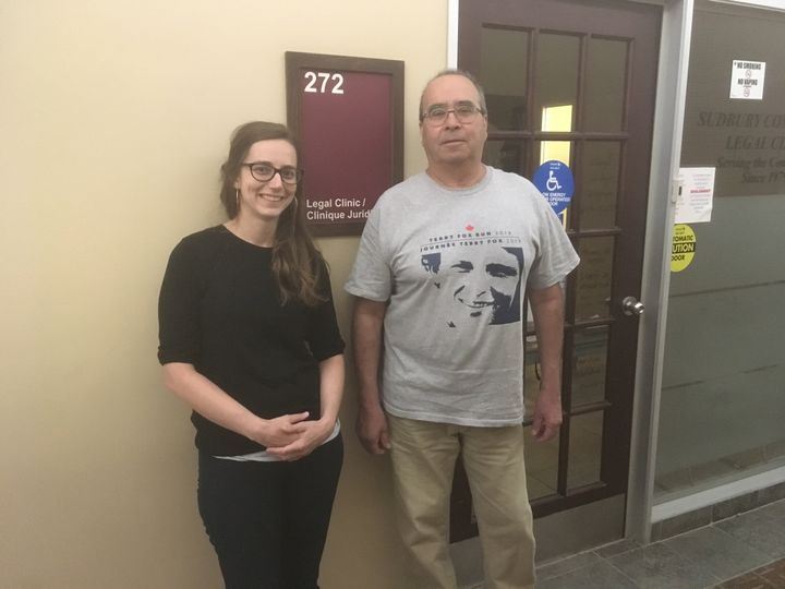 Monique Woolnough, executive director of the Sudbury Community Legal Clinic, poses for a photo with board member and client Kevin Greer.