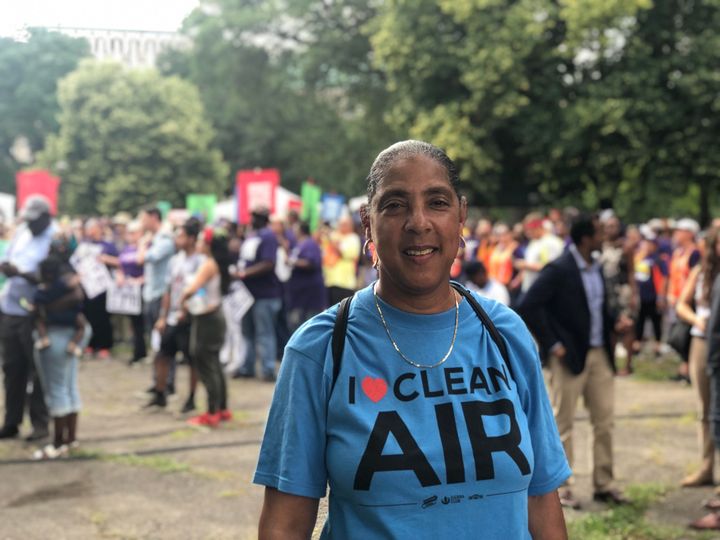 Theresa Landrum outside the rally in Cass Park on Tuesday. When asked her age, Landrum said she'd been "suffering in pollution for more than 60 years." 
