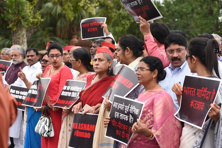 MPs hold a protest demanding justice for the survivor in the Unnao rape case. 