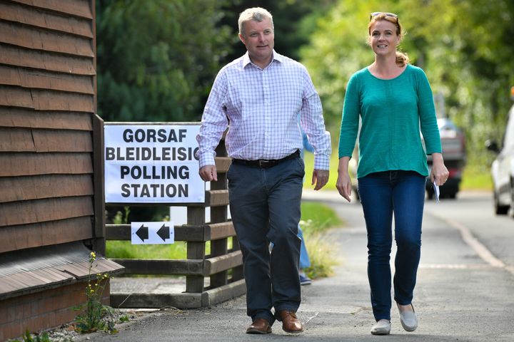 Tory candidate Chris Davies heading to the polls with his wife in the Brecon and Radnorshire by-election on Thursday 