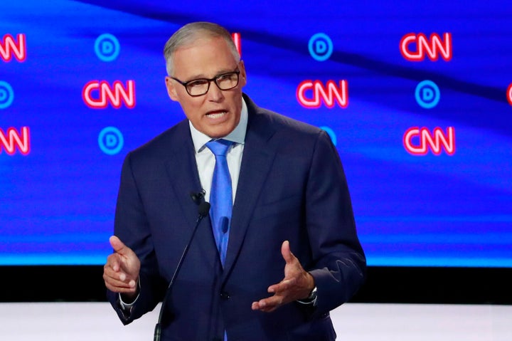 Washington Gov. Jay Inslee, pictured at Wednesday's Democratic debate, was the first governor to condemn Donald Trump's Muslim ban and challenge it in court.