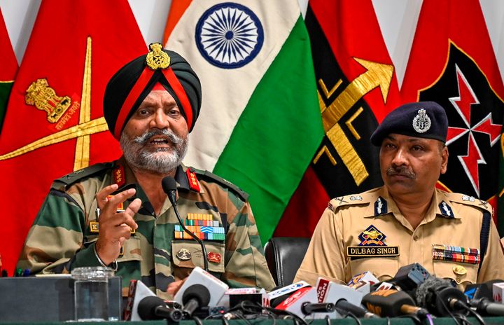 Indian Army General Officer Commanding (GOC) 15 Corps KJS Dhillon (L) speaks next Police Chief Dilbagh Singh during a press conference at the Army headquarters in Srinagar on August 2, 2019.