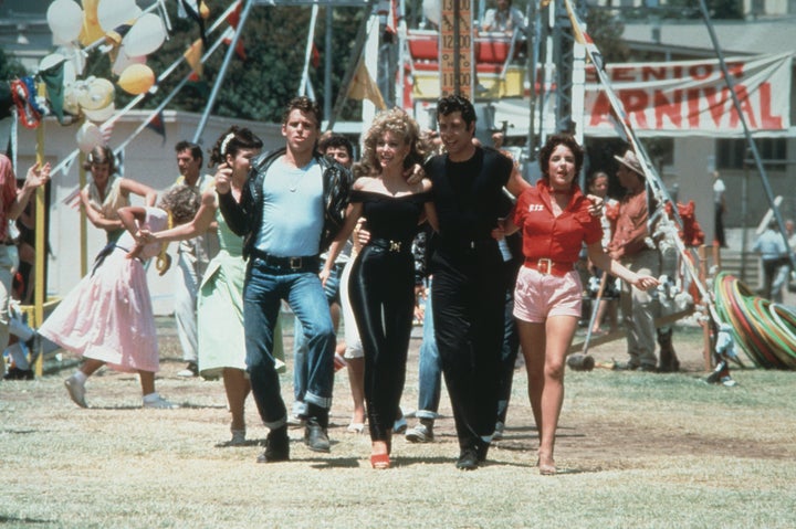 "Grease" followed the romance between Danny Zuko (John Travolta) and Australian transfer student Sandy Olsson (Olivia Newton-John).