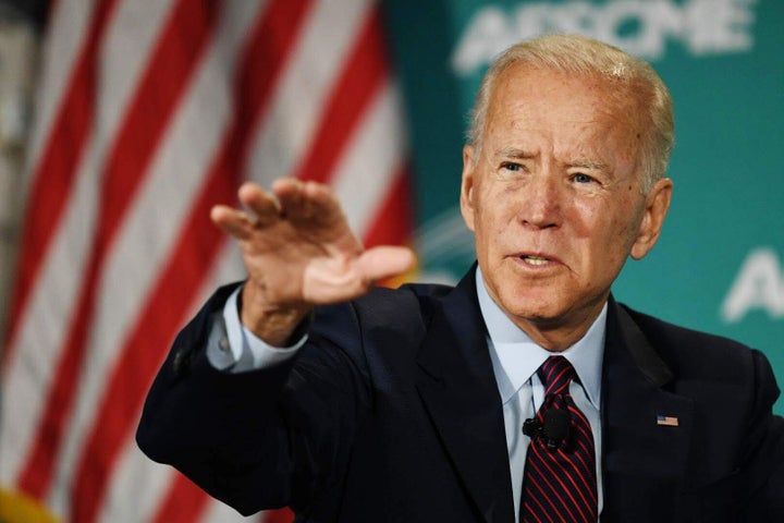 Joe Biden speaks at the AFSCME forum in Las Vegas on Saturday. "This has been an all-out war on suppressing wages to increase profits," he says.