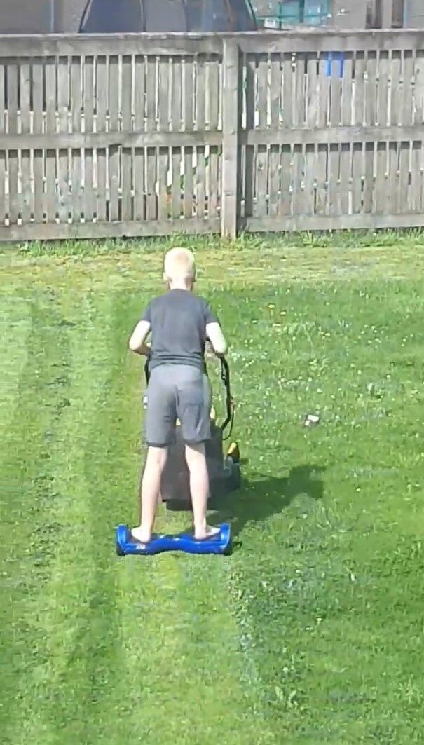 Boy Uses Hoverboard To Help Him Mow The Lawn In Genius Life Hack