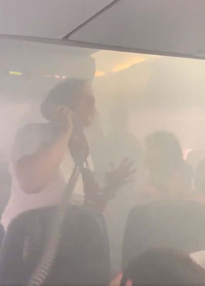 Passengers were evacuated from the plane after the cabin filled with acrid white smoke 