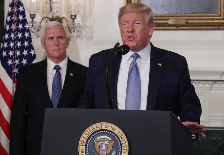 U.S. President Donald Trump makes a speech at the White House on Aug. 5, 2019, with U.S. Vice-President Mike Pence standing behind him.