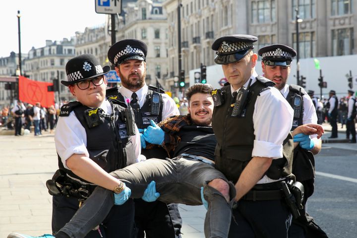 A protestor getting arrested in London in April.