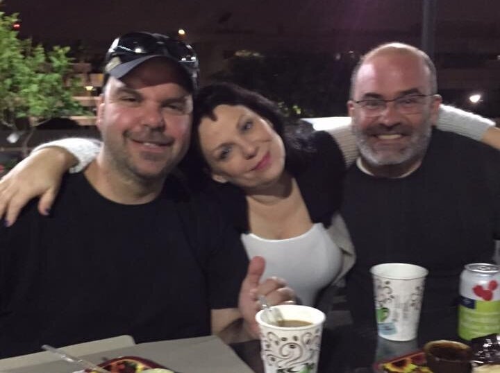 Walton, Smyth and Walton's husband, Pablito, hanging out in the BBQ area of their apartment complex (2015).