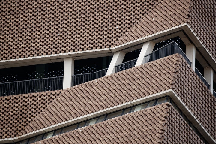 A 6-year-old boy remains hospitalized after a 17-year-old boy allegedly threw him over this 10th-floor viewing gallery at the