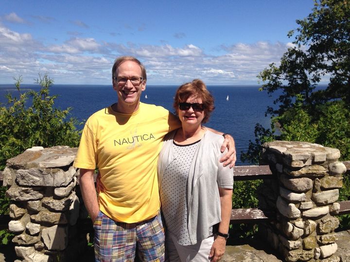 Posing on a scenic Lake Michigan overlook during one of our travel adventures.