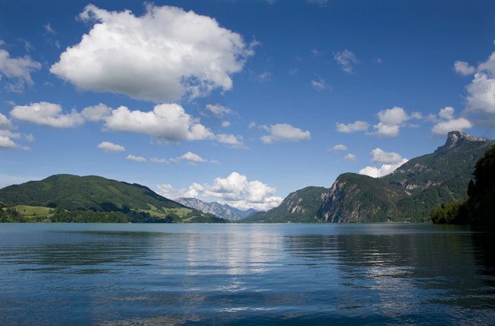 The man was swimming with a companion at the Schwarzindien beach area in Mondsee (pictured is Lake Mondsee) 