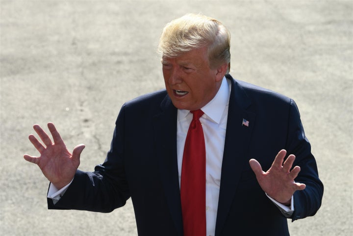 U.S. President Donald Trump speaks to the press as he departs the White House on August 7, 2019 in Washington, D.C.