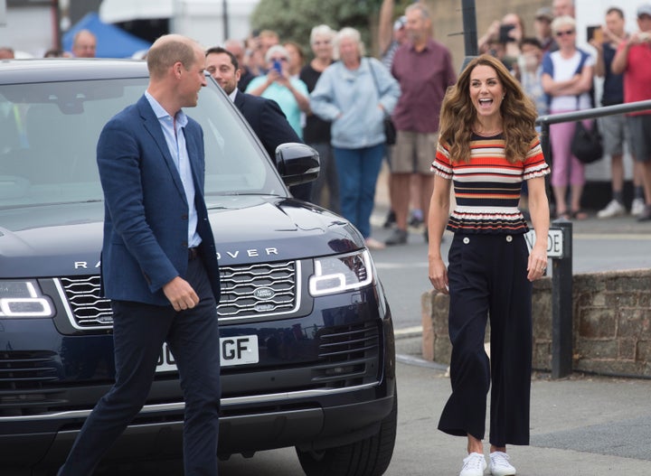 The Duke and Duchess of Cambridge arrive at the Royal Yacht Squadron during the inaugural King's Cup regatta on Aug. 8 in Cowes, England.