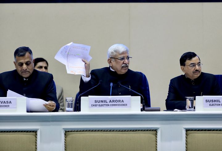 Chief Election Commissioner Sunil Arora, center, speaks during a press conference in New Delhi, March 10, 2019.