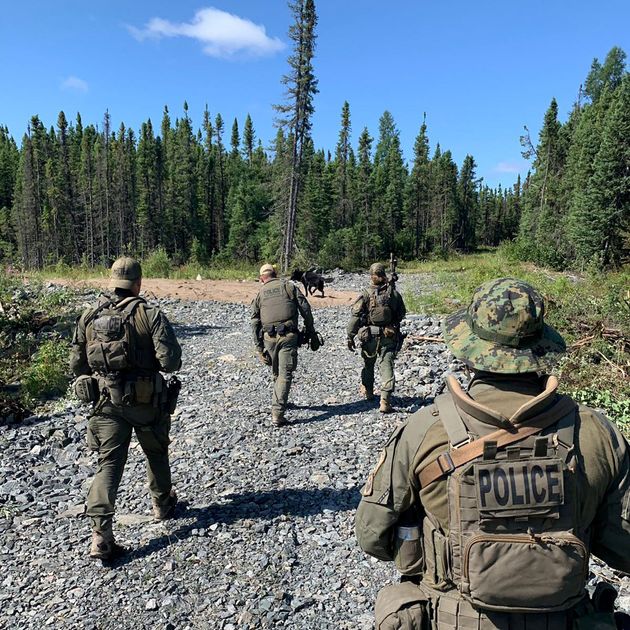 Royal Canadian Mounted Police searching for the suspects in Gillam, Manitoba, Canada on July 29 