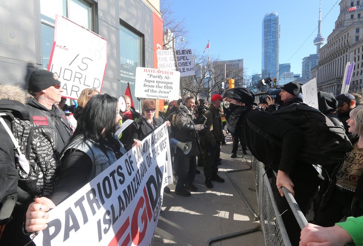 Far-right demonstrators and counterprotesters in Toronto in March 2019.