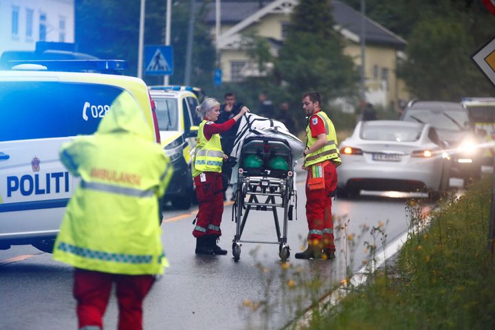 Emergency crews are seen near a stretcher after a shooting in al-Noor Islamic center mosque, near Oslo, Norway August 10, 2019