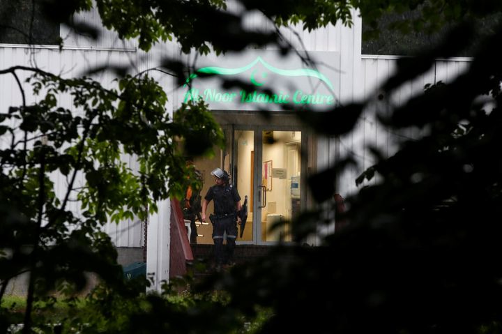 Police officers walk out of al-Noor Islamic center mosque after a shooting, near Oslo, Norway August 10, 2019.