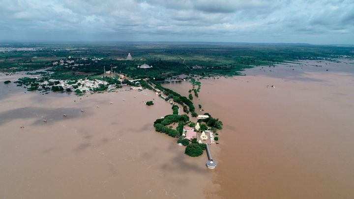 An aerial view of the Kudala Sangama, an important centre of pilgrimage for the Lingayat community, submerged in floodwaters in Bagalkot district in Karnataka about 460 kms of the South Indian city of Bangalore on August 10, 2019.