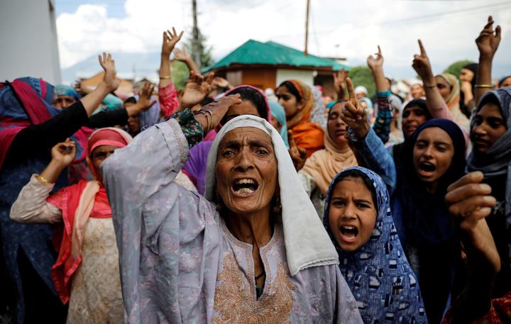 Kashmiri women shout slogans during a protest after the scrapping of the special constitutional status for Kashmir by the government, in Srinagar, August 11, 2019. 