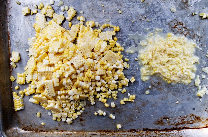 See that white liquid pooling near the freshly cut corn? That's the key to a delicious chowder.