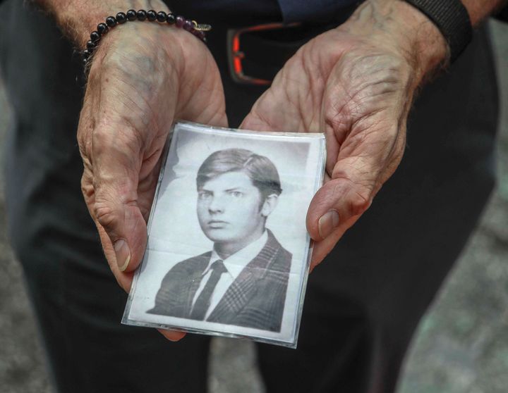 This Wednesday, Aug. 7, 2019 photo shows Brian Toale shows a photo of himself at 16 years old in New York. Toale, 66, who says he was molested by an employee at a Catholic high school he attended on Long Island, was one of the leaders in the fight to pass the Child Victims Act. 