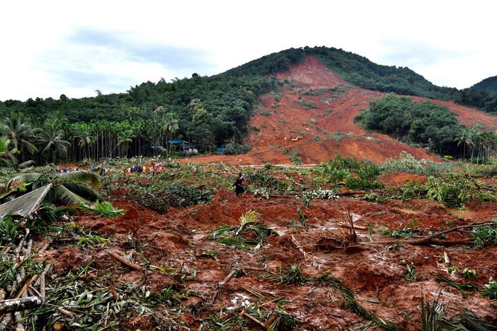 This photograph provided by the All India Congress Committee, shows a landslide site in Kavalappara, Malappuram district, Kerala, on Aug. 11, 2019. 