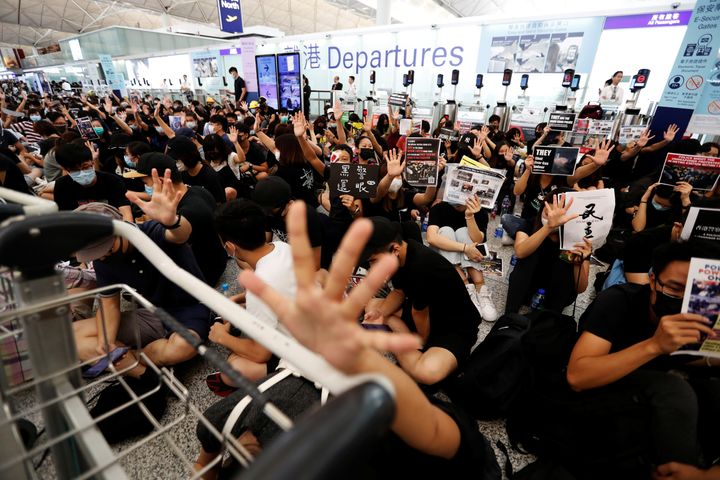 Hong Kong airport has reopened after protesters forced its shut down on Monday and Tuesday