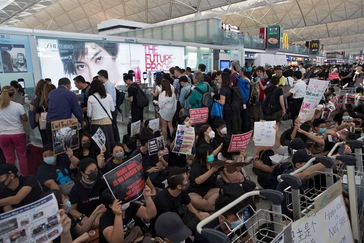 Protesters held a sit-in rally near the departure gates