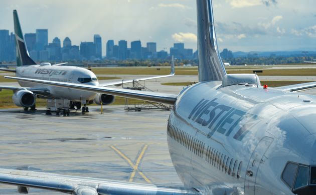 A view of WestJet planes at Calgary International Airport, Mon. Sept. 10,