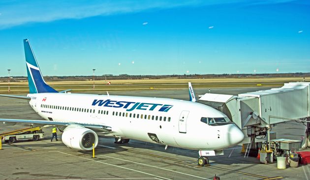 A WestJet Boeing 737 unloading at a gate in Edmonton, Oct. 18,