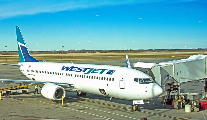 A WestJet Boeing 737 unloading at a gate in Edmonton, Oct. 18, 2015.