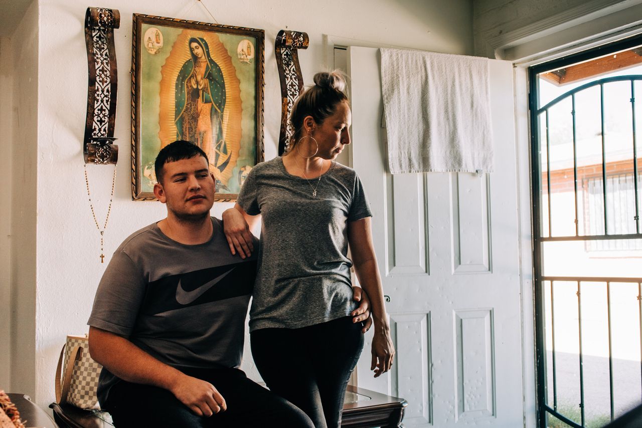 Eleonora Mendivil stands beside her brother, Angel Mendivil Perez, in her home in Tucson, Arizona, on Aug. 12, 2019. "I have to be dependent on somebody, like my sister or my mother, to get from point A to point B. I just want to be independent," says Mendivil Perez.