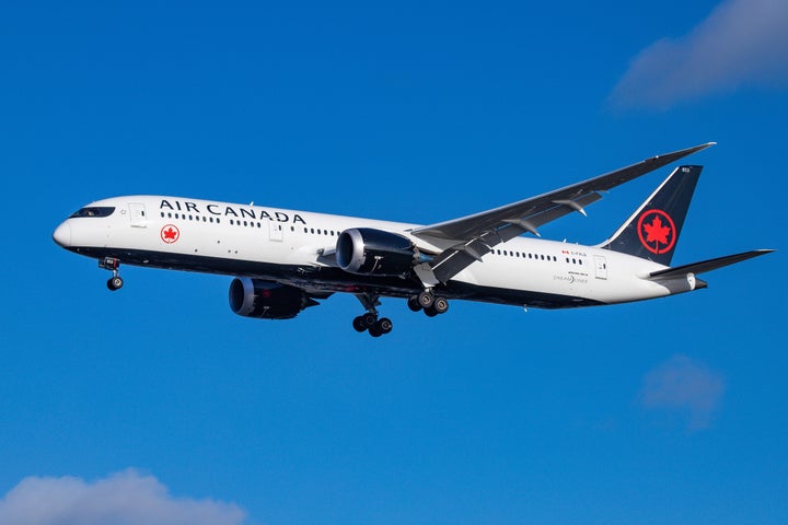 A Boeing 787-9 Dreamliner aircraft belonging to Air Canada is photographed before landing at London Heathrow International Airport on Aug. 2, 2019. 