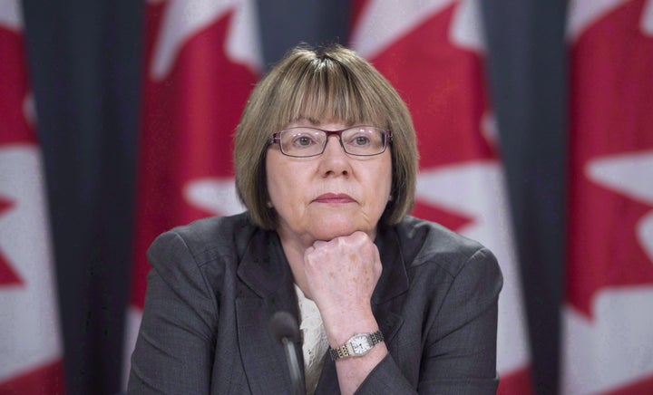 Anne McLellan, leader of the federal task force on marijuana, listens to a question during a news conference in Ottawa on December 13, 2016.