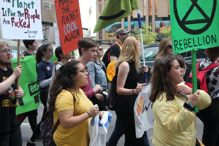 Members of Climate Justice Edmonton, Beaver Hills Warriors and Edmonton Youth For Climate march together on June 28. 