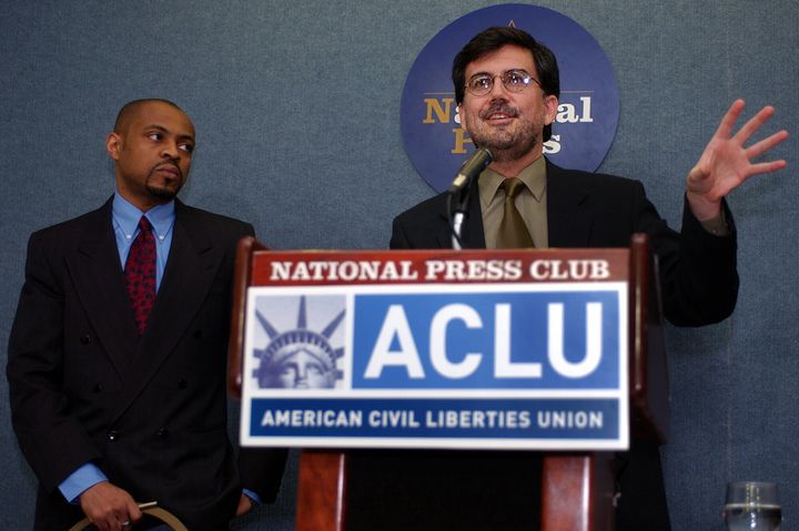 ACLU staff attorney Reginald T. Shuford, left, and David C. Fathi, right, at the National Press Club in Washington, D.C., on April 6, 2004.