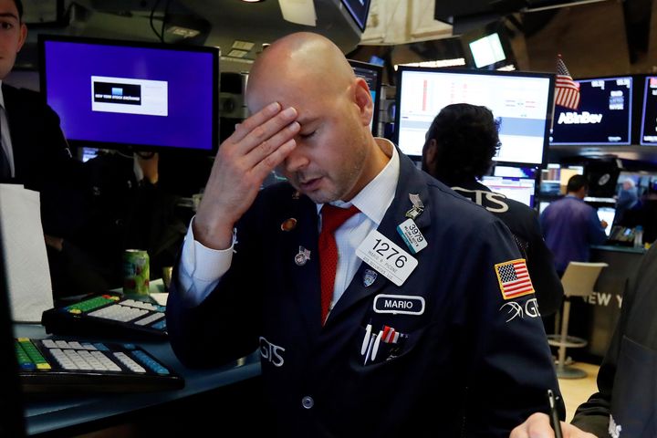 Specialist Mario Picone working on the floor of the New York Stock Exchange. 